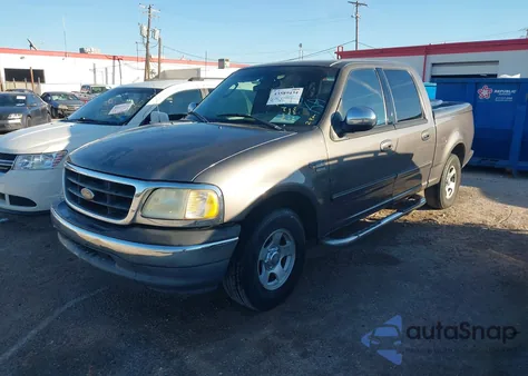 2002 Ford F-150 Lariat/Xlt из США, поврежденный, VIN 1FTRW07672KE40157